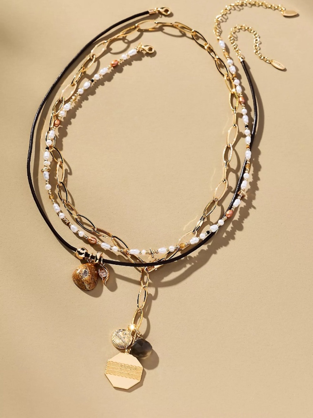 Anthropologie Shades of Sea Layered Necklaces Charm Edition in Light Sand NWT